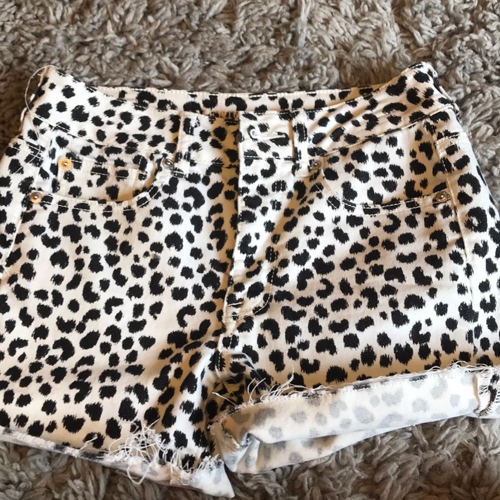 Cow print jean shorts